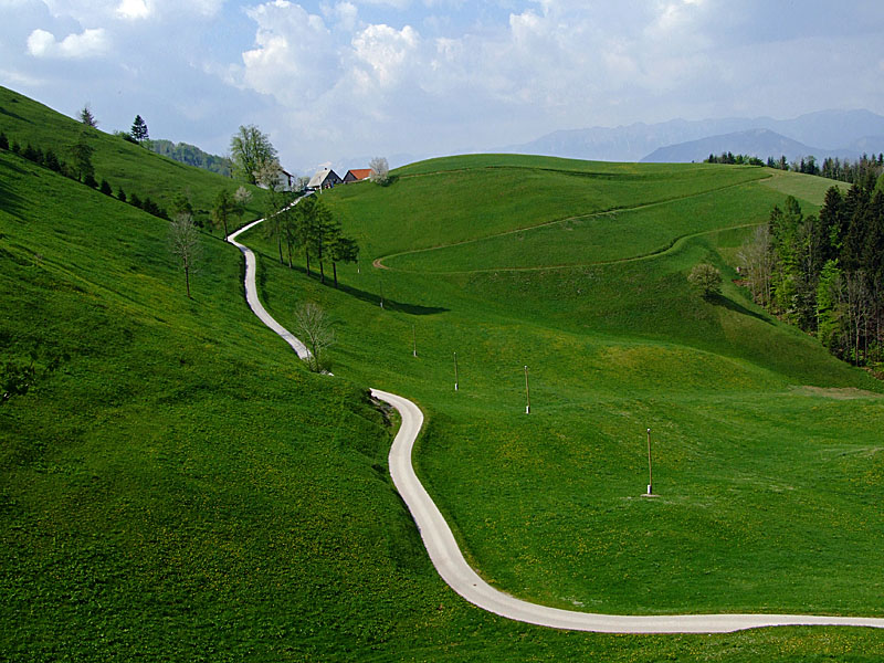 The hilly landscape above Idrija by Vid Pogacnik