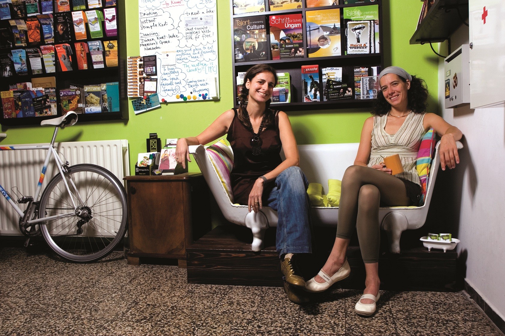 Two hostel guests sitting on sofa Aventura Boutique Hostel 