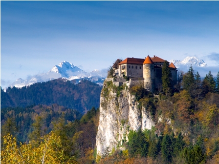 Bled, the Castle, with Triglav in the background (Author-Klemen Kunaver)