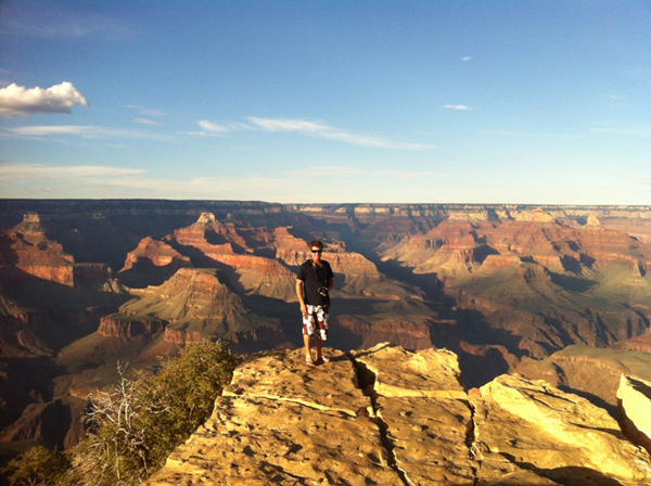 My husband standing on the edge of the Canyon