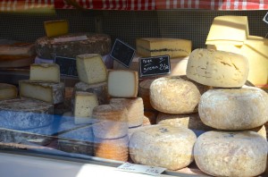 French market stall selling cheese