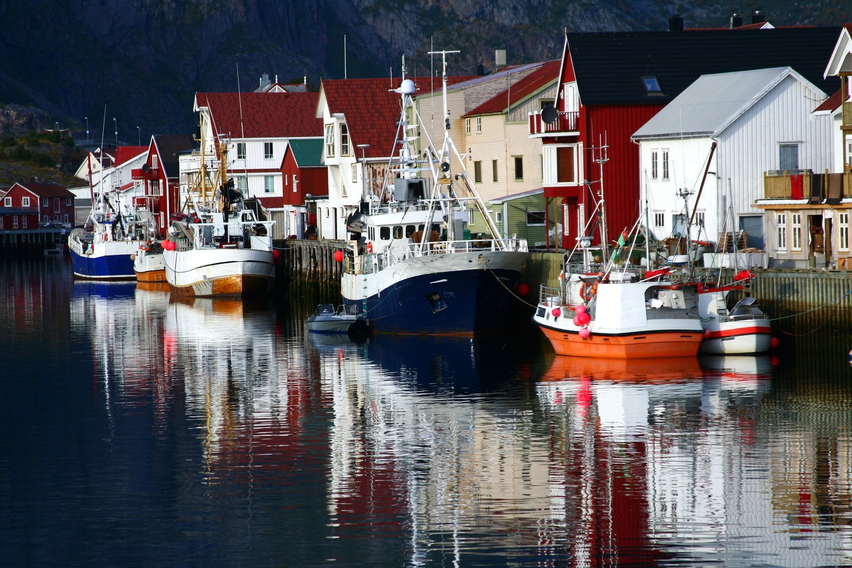 Boats reflecting in the sea Norway