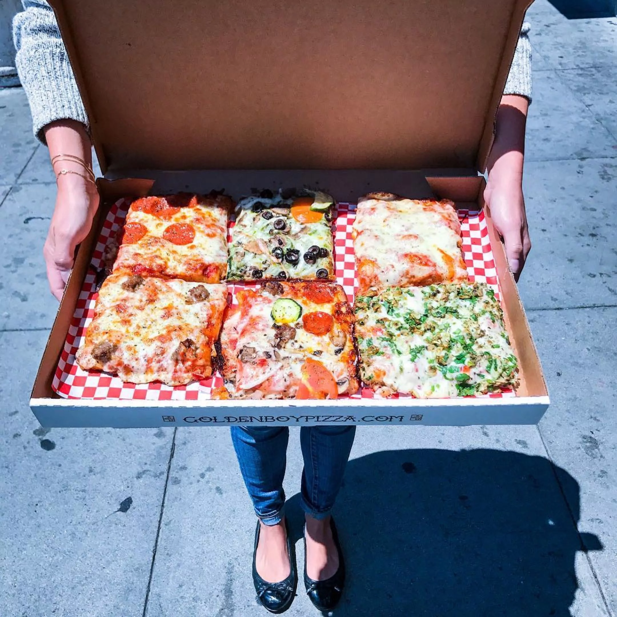 Slices of focaccia pizza from Golden Boy by @marinfoodie